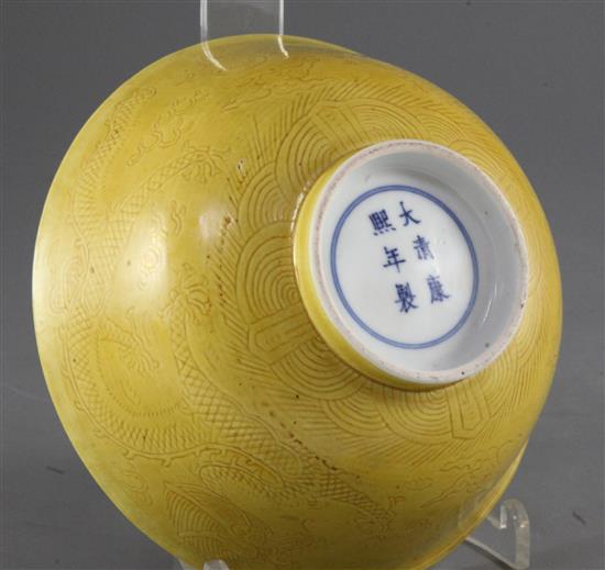 A Chinese yellow ground dragon bowl, Kangxi mark, Guangxu period, 16cm